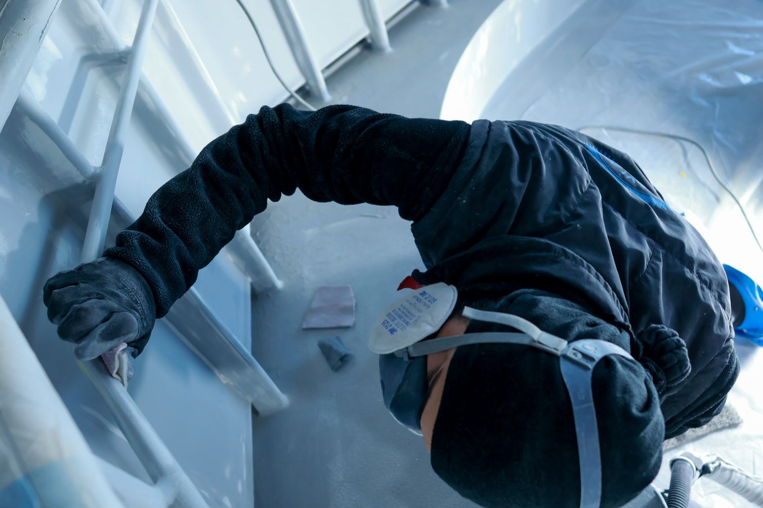 Topcoat work inside the paint tent